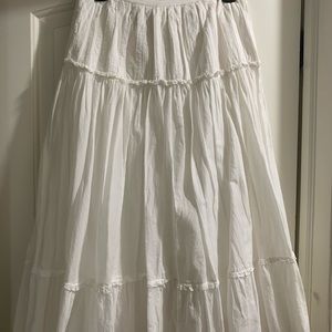 White Midi, Drop Waist, Lined Peasant Skirt. Fitted waist with side zipper.